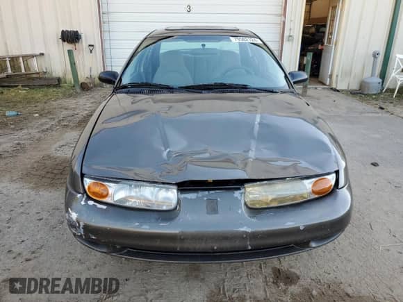 2000 Saturn SL with VIN 1G8ZJ5274YZ256204, listed as a Copart auction lot 79502124 with 190,120 mi miles and Salvage title. Bid and sale history available at DreamBid. Image 5.