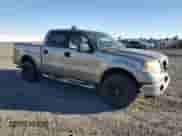 2006 Ford F-150 XLT with VIN 1FTPW145X6KD74881, listed as a Copart auction lot 85202045 with 220,674 mi miles and Salvage title. Bid and sale history available at DreamBid. Image 4.