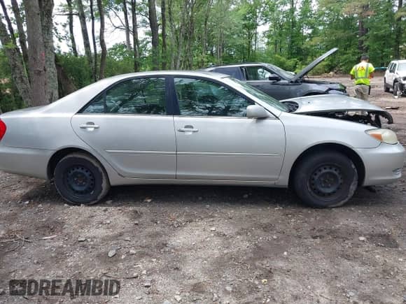 2004 Toyota Camry LE with VIN 4T1BE32K24U811061, listed as a IAAI auction lot 42340943 with Not provided miles and . Bid and sale history available at DreamBid. Image 12.