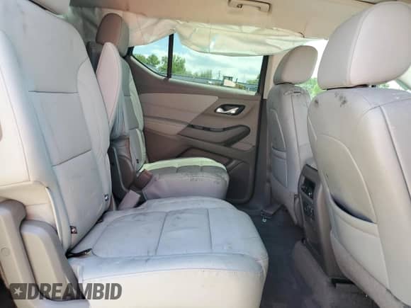 2021 Chevrolet Traverse Premier с VIN 1GNEVKKW2MJ138490, выставлен на аукционе Copart как лот 55822675 с пробегом Не указан миль и Списание • Salvage title. История ставок и продаж доступна на DreamBid. Изображение 11.