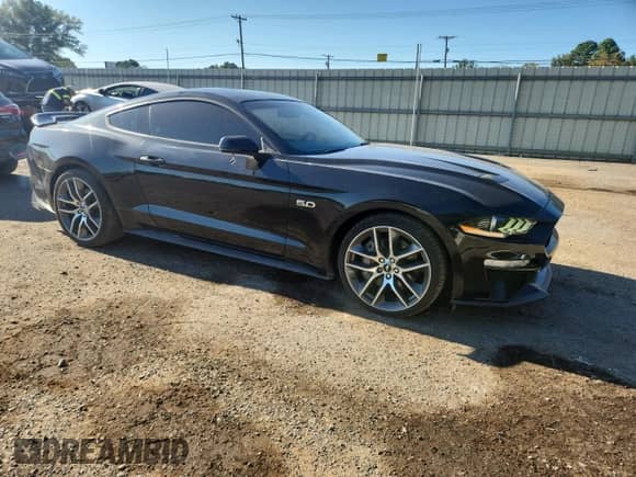 2019 Ford Mustang GT с VIN 1FA6P8CF7K5142913, выставлен на аукционе Copart как лот 85887985 с пробегом 97 881 миль миль и Списание • Salvage title. История ставок и продаж доступна на DreamBid. Изображение 4.