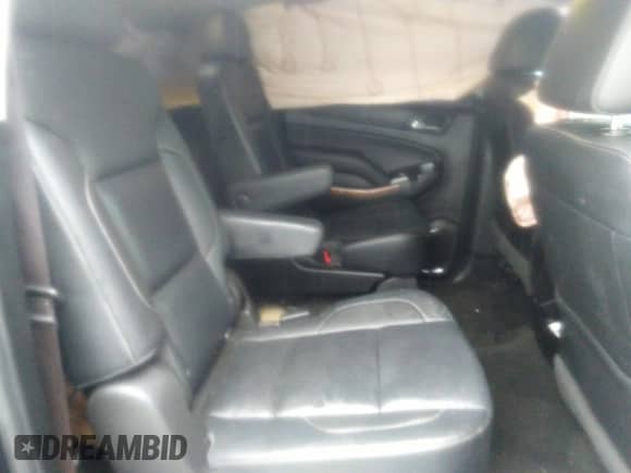 2017 Chevrolet Suburban Premier z VIN 1GNSCJKCXHR312158, wystawiony jako IAAI lot #40399105 z przebiegiem 150 560 mil mil oraz . Historia ofert i sprzedaży dostępna na DreamBid. Obrazek 8.