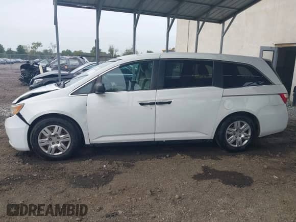 2011 Honda Odyssey LX with VIN 5FNRL5H28BB028618, listed as a IAAI auction lot 43339792 with 144,001 mi miles and . Bid and sale history available at DreamBid. Image 14.