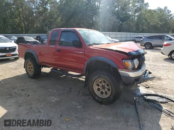 2002 Toyota Tacoma z VIN 5TEWM72NX2Z145081, wystawiony jako Copart lot #83818635 z przebiegiem Nie podano mil oraz Szkoda całkowita • Salvage title. Historia ofert i sprzedaży dostępna na DreamBid. Obrazek 4.