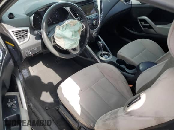 2014 Hyundai Veloster z VIN KMHTC6AD3EU196343, wystawiony jako Copart lot #59891375 z przebiegiem 127 594 mil mil oraz Szkoda całkowita • Salvage title. Historia ofert i sprzedaży dostępna na DreamBid. Obrazek 8.