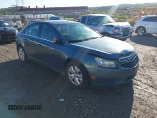 2012 Chevrolet Cruze LS z VIN 1G1PC5SH8C7301870, wystawiony jako IAAI lot #43391488 z przebiegiem 203 055 mil mil oraz . Historia ofert i sprzedaży dostępna na DreamBid. Obrazek 1.