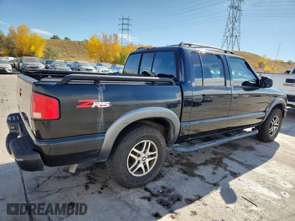 2003 Chevrolet S-10 LS with VIN 1GCDT13X53K180687, listed as a Copart auction lot 89549505 with 142,593 mi miles and Salvage title. Bid and sale history available at DreamBid. Image 3.