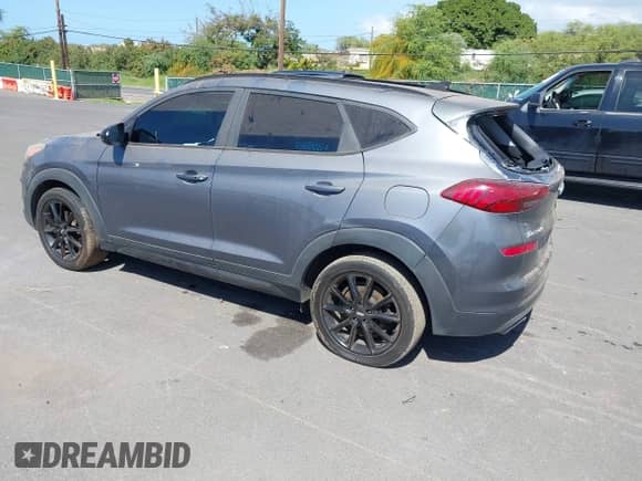 2019 Hyundai Tucson Sport z VIN KM8J33AL5KU925161, wystawiony jako IAAI lot #41570199 z przebiegiem 85 081 mil mil oraz . Historia ofert i sprzedaży dostępna na DreamBid. Obrazek 3.