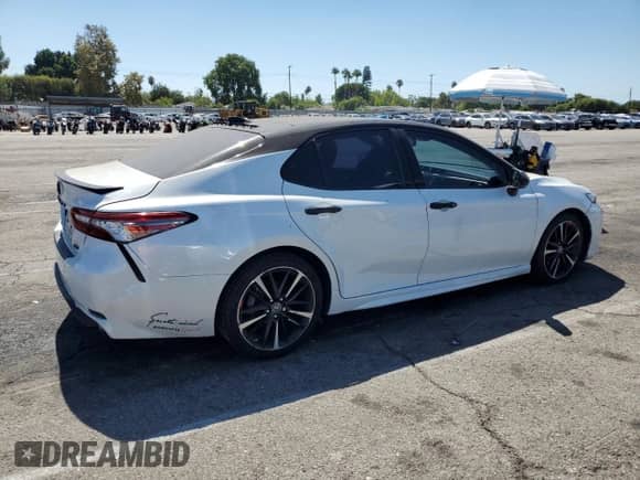 2018 Toyota Camry XSE с VIN 4T1BZ1HK7JU010492, выставлен на аукционе Copart как лот 71482645 с пробегом 77 969 миль миль и Списание • Salvage title. История ставок и продаж доступна на DreamBid. Изображение 3.