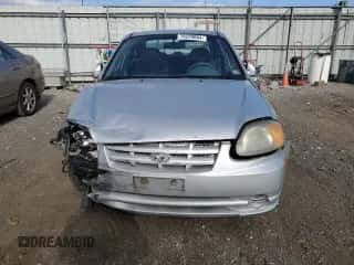 2005 Hyundai Accent GLS с VIN KMHCG45C05U618580, выставлен на аукционе Copart как лот 79239064 с пробегом 54 228 миль миль и Списание • Salvage title. История ставок и продаж доступна на DreamBid. Изображение 5.