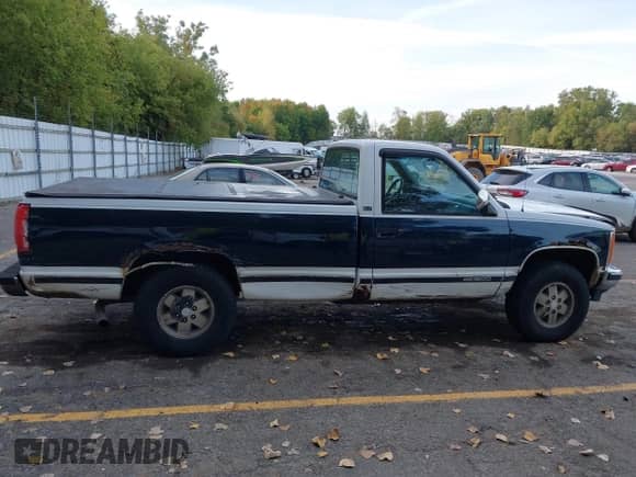 1989 GMC Sierra 1500 with VIN 1GTDK14K4KE543029, listed as a IAAI auction lot 43346336 with 218,934 mi miles and . Bid and sale history available at DreamBid. Image 12.