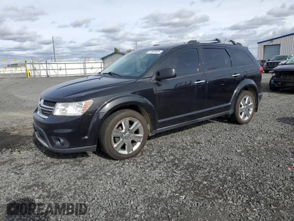 2012 Dodge Journey R/T with VIN 3C4PDDFG5CT210583, listed as a Copart auction lot 87387025 with 180,401 mi miles and Clean title. Bid and sale history available at DreamBid. Image 1.