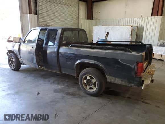 1994 Dodge Dakota z VIN 1B7GL23Y5RW142177, wystawiony jako Copart lot #76364964 z przebiegiem 237 632 mil mil oraz Szkoda całkowita • Salvage title. Historia ofert i sprzedaży dostępna na DreamBid. Obrazek 2.