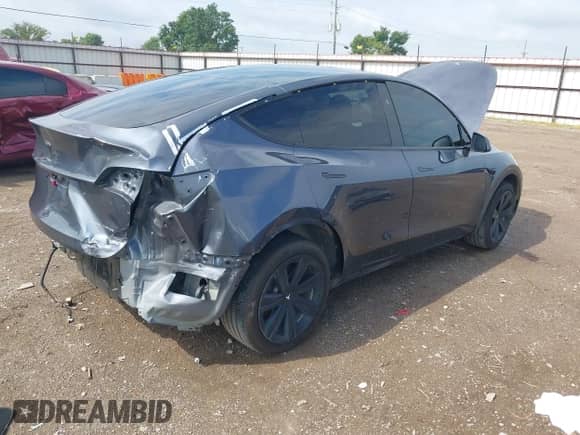 2023 Tesla Model Y Long Range with VIN 7SAYGDEE4PA202135, listed as a IAAI auction lot 42975478 with 27,065 mi miles and . Bid and sale history available at DreamBid. Image 4.
