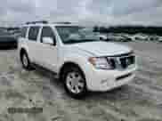 2012 Nissan Pathfinder SV с VIN 5N1AR1NN2CC638527, выставлен на аукционе Copart как лот 60555725 с пробегом 186 714 миль миль и Списание • Salvage title. История ставок и продаж доступна на DreamBid. Изображение 14.