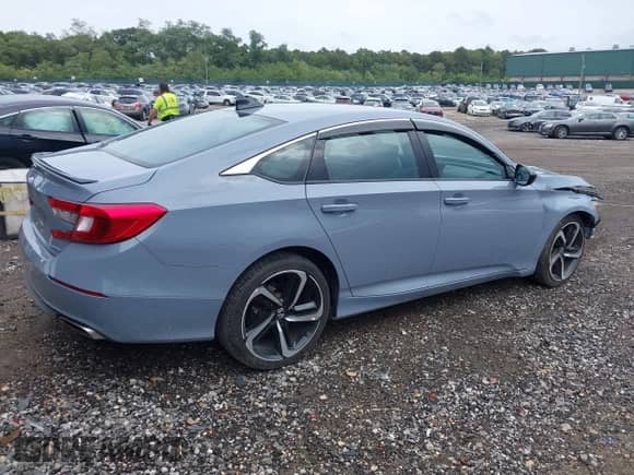 2022 Honda Accord Sport z VIN 1HGCV1F38NA021445, wystawiony jako IAAI lot #43277130 z przebiegiem 48 976 mil mil oraz . Historia ofert i sprzedaży dostępna na DreamBid. Obrazek 4.