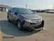 2013 Honda Odyssey EX-L с VIN 5FNRL5H68DB054612, выставлен на аукционе Copart как лот 71016025 с пробегом 180 538 миль миль и Списание • Salvage title. История ставок и продаж доступна на DreamBid. Изображение 14.