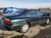 1996 Honda Accord with VIN 1HGCE6644TA028850, listed as a Copart auction lot 42564835 with 116,354 mi miles and Salvage title. Bid and sale history available at DreamBid. Image 3.