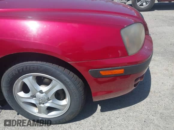 2004 Hyundai Elantra GT z VIN KMHDN56D54U111535, wystawiony jako IAAI lot #42677242 z przebiegiem 125 783 mil mil oraz . Historia ofert i sprzedaży dostępna na DreamBid. Obrazek 6.