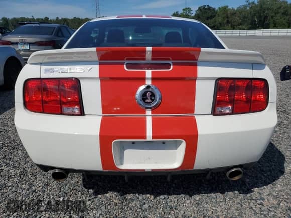 2009 Ford Mustang Shelby GT500 z VIN 1ZVHT88SX95132470, wystawiony jako Copart lot #73875834 z przebiegiem Nie podano mil oraz Szkoda całkowita • Salvage title. Historia ofert i sprzedaży dostępna na DreamBid. Obrazek 6.