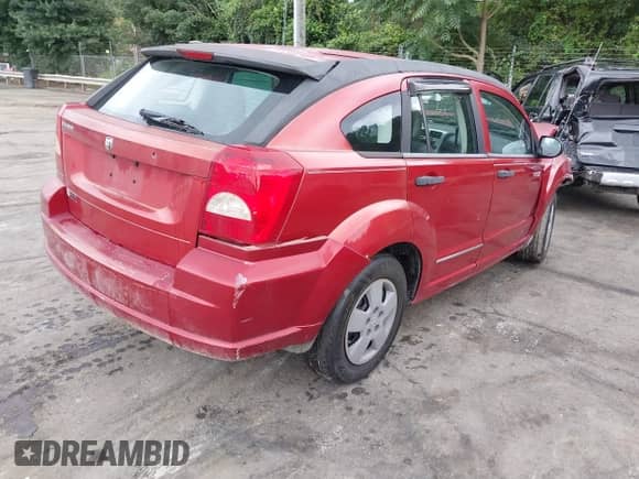 2008 Dodge Caliber SE with VIN 1B3HB28B18D561909, listed as a IAAI auction lot 42957456 with 167,709 mi miles and . Bid and sale history available at DreamBid. Image 4.