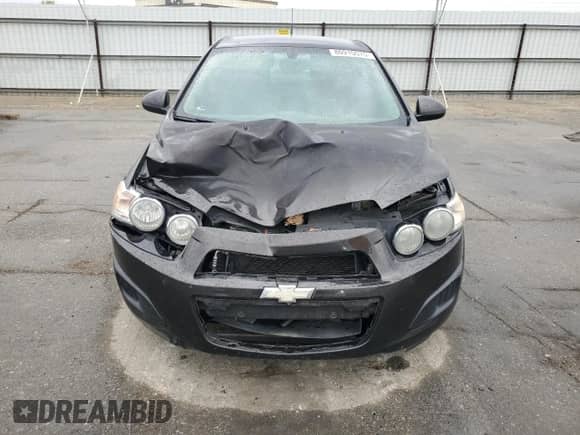 2014 Chevrolet Sonic LT z VIN 1G1JC5SG7E4106134, wystawiony jako Copart lot #80910575 z przebiegiem 149 644 mil mil oraz Szkoda całkowita • Salvage title. Historia ofert i sprzedaży dostępna na DreamBid. Obrazek 5.