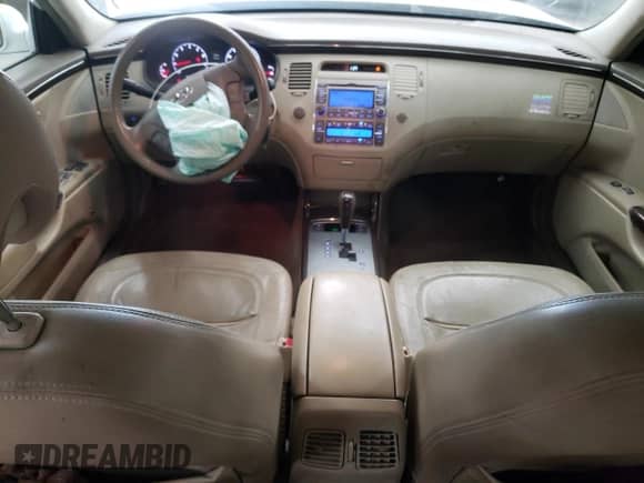 2009 Hyundai Azera GLS z VIN KMHFC46D09A353781, wystawiony jako Copart lot #62323855 z przebiegiem 169 064 mil mil oraz Szkoda całkowita • Salvage title. Historia ofert i sprzedaży dostępna na DreamBid. Obrazek 8.