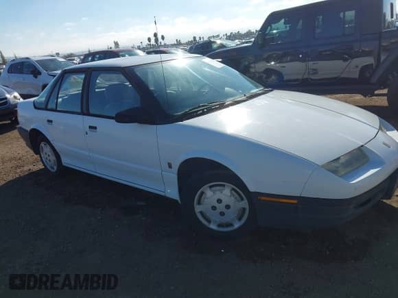 1995 Saturn SL with VIN 1G8ZH5281SZ240568, listed as a IAAI auction lot 43291658 with 67,255 mi miles and . Bid and sale history available at DreamBid. Image 1.