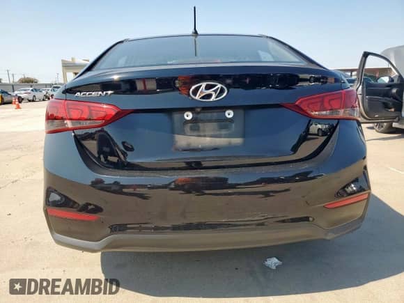 2018 Hyundai Accent SE z VIN 3KPC24A32JE035171, wystawiony jako Copart lot #71985555 z przebiegiem 127 023 mil mil oraz Czysty tytuł • Clean title. Historia ofert i sprzedaży dostępna na DreamBid. Obrazek 6.