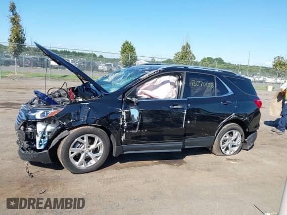 2021 Chevrolet Equinox Premier z VIN 2GNAXXEV4M6144507, wystawiony jako IAAI lot #43070178 z przebiegiem 43 748 mil mil oraz . Historia ofert i sprzedaży dostępna na DreamBid. Obrazek 14.