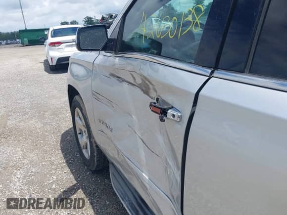 2015 Chevrolet Tahoe LTZ with VIN 1GNSCCKC9FR293871, listed as a IAAI auction lot 42630138 with 205,056 mi miles and . Bid and sale history available at DreamBid. Image 17.