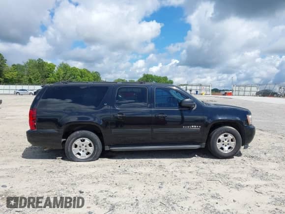 2010 Chevrolet Suburban LT z VIN 1GNUCJE08AR192831, wystawiony jako IAAI lot #42534754 z przebiegiem 165 741 mil mil oraz . Historia ofert i sprzedaży dostępna na DreamBid. Obrazek 13.