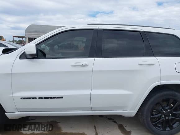 2020 Jeep Grand Cherokee Laredo E with VIN 1C4RJEAG9LC306226, listed as a IAAI auction lot 42839164 with 139,980 mi miles and . Bid and sale history available at DreamBid. Image 15.