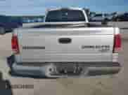 2004 Dodge Dakota z VIN 1D7FL16K44S506611, wystawiony jako Copart lot #82088555 z przebiegiem 264 052 mil mil oraz Szkoda całkowita • Salvage title. Historia ofert i sprzedaży dostępna na DreamBid. Obrazek 6.