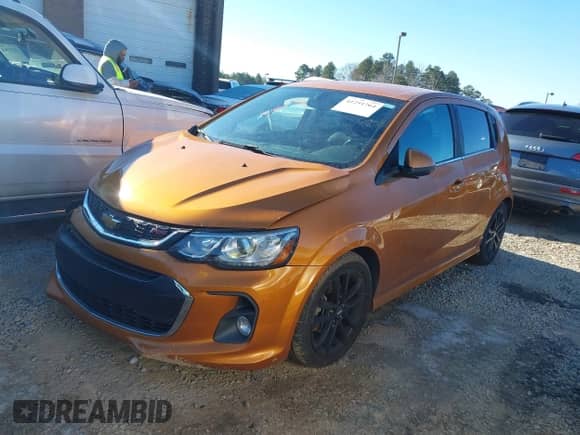 2017 Chevrolet Sonic Premier with VIN 1G1JF6SB4H4123768, listed as a IAAI auction lot 41251764 with 71,616 mi miles and . Bid and sale history available at DreamBid. Image 2.
