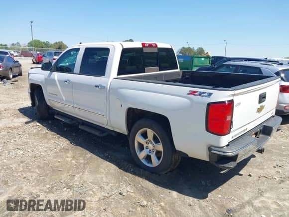 2014 Chevrolet Silverado 1500 LTZ with VIN 3GCUKSECXEG446055, listed as a IAAI auction lot 41988435 with 165,833 mi miles and . Bid and sale history available at DreamBid. Image 3.