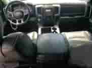 2014 Ram 1500 Longhorn Limited с VIN 1C6RR7WT9ES187779, выставлен на аукционе Copart как лот 52677245 с пробегом 184 111 миль миль и Списание • Salvage title. История ставок и продаж доступна на DreamBid. Изображение 8.