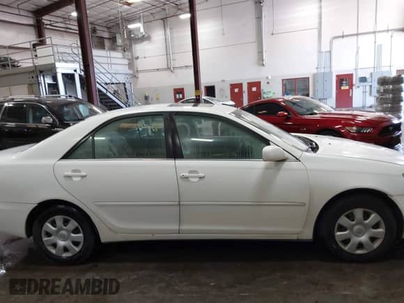 2002 Toyota Camry LE с VIN 4T1BE32K02U077095, выставлен на аукционе IAAI как лот 42405814 с пробегом 312 692 миль миль и . История ставок и продаж доступна на DreamBid. Изображение 13.