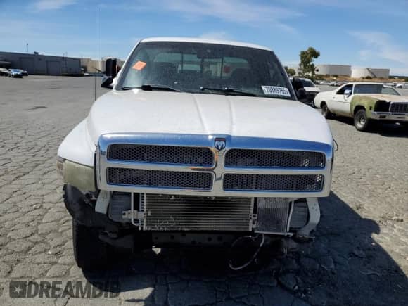 2001 Dodge 2500 с VIN 3B7KF23621G756087, выставлен на аукционе Copart как лот 70889755 с пробегом 135 873 миль миль и Списание • Salvage title. История ставок и продаж доступна на DreamBid. Изображение 5.