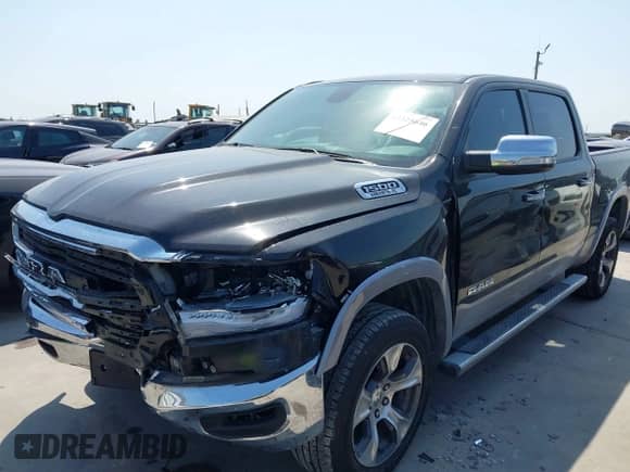 2020 Ram 1500 Laramie with VIN 1C6SRFJT0LN323862, listed as a IAAI auction lot 42325646 with 81,520 mi miles and . Bid and sale history available at DreamBid. Image 17.
