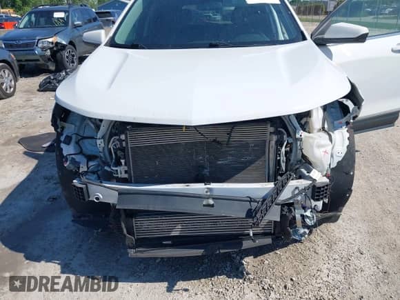 2019 Chevrolet Equinox LT z VIN 2GNAXUEV6K6164950, wystawiony jako IAAI lot #42615581 z przebiegiem 140 010 mil mil oraz . Historia ofert i sprzedaży dostępna na DreamBid. Obrazek 6.