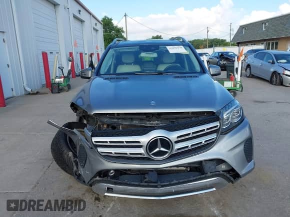 2017 Mercedes-Benz GLS 450 with VIN 4JGDF6EE6HA770387, listed as a IAAI auction lot 43050470 with 104,872 mi miles and . Bid and sale history available at DreamBid. Image 12.