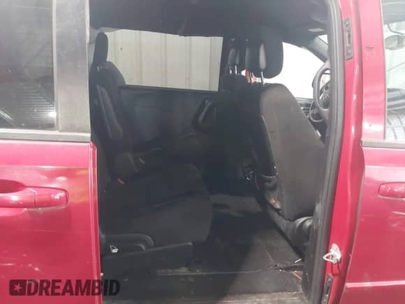 2014 Dodge Grand Caravan SE with VIN 2C4RDGBG3ER466291, listed as a IAAI auction lot 42801240 with 117,546 mi miles and . Bid and sale history available at DreamBid. Image 8.