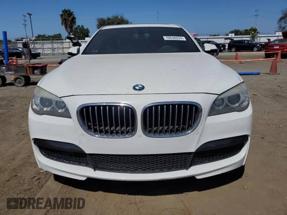 2015 BMW 7 Series with VIN WBAYG6C59FD383685, listed as a Copart auction lot 72630224 with 157,780 mi miles and Salvage title. Bid and sale history available at DreamBid. Image 5.