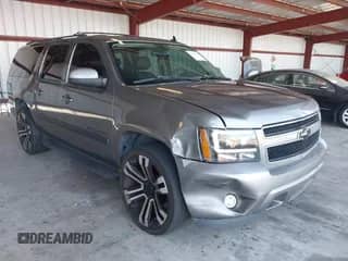 2007 Chevrolet Suburban LS with VIN 1GNFC16057J236556, listed as a IAAI auction lot 43237366 with Not provided miles and . Bid and sale history available at DreamBid. Image 1.