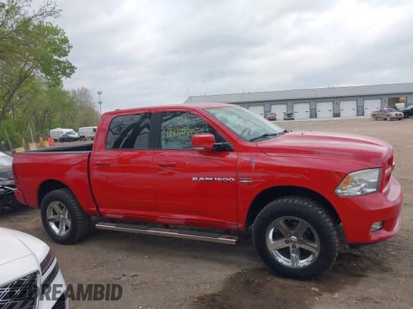 2011 Ram 1500 SLT with VIN 1D7RV1CTXBS557421, listed as a IAAI auction lot 42149415 with 119,968 mi miles and . Bid and sale history available at DreamBid. Image 13.