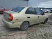 2002 Hyundai Accent GL z VIN KMHCG45C02U296132, wystawiony jako Copart lot #59401835 z przebiegiem 115 421 mil mil oraz Czysty tytuł • Clean title. Historia ofert i sprzedaży dostępna na DreamBid. Obrazek 3.