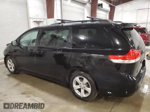 2012 Toyota Sienna LE AAS with VIN 5TDKK3DC1CS265097, listed as a Copart auction lot 86068265 with 142,841 mi miles and Salvage title. Bid and sale history available at DreamBid. Image 2.