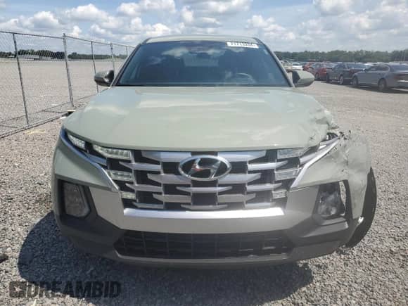 2024 Hyundai Santa Cruz SE с VIN 5NTJADAE4RH083548, выставлен на аукционе Copart как лот 71713204 с пробегом 23 816 миль миль и На запчасти • Non repairable. История ставок и продаж доступна на DreamBid. Изображение 5.