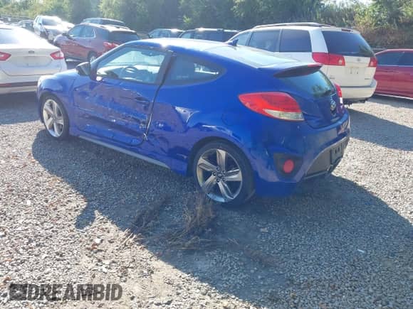 2013 Hyundai Veloster Turbo с VIN KMHTC6AE7DU140638, выставлен на аукционе IAAI как лот 43169612 с пробегом 162 811 миль миль и . История ставок и продаж доступна на DreamBid. Изображение 3.